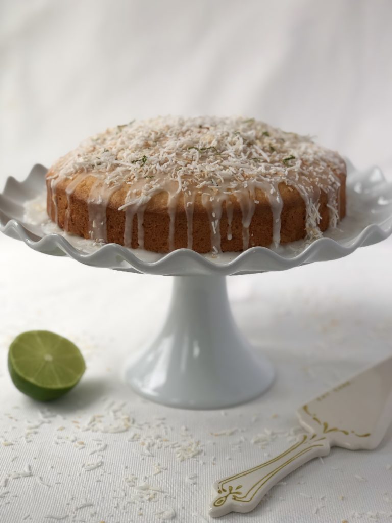 Coconut and Key Lime Cake on a pedestal