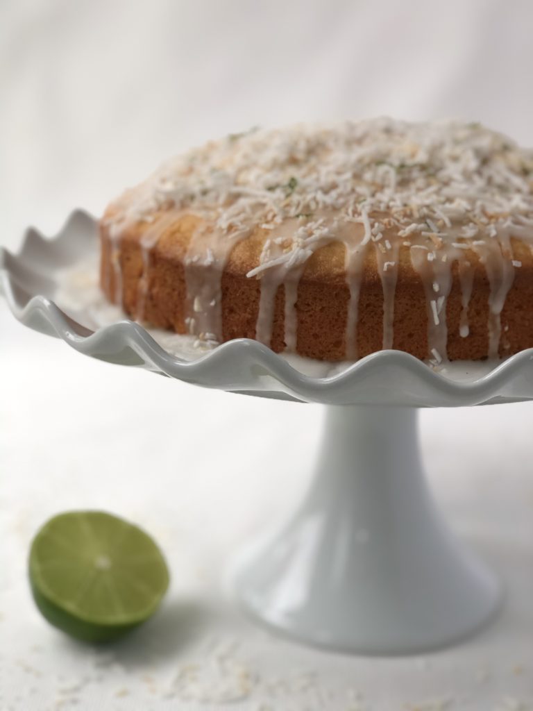 lime glaze dribbling down the sides of the cake