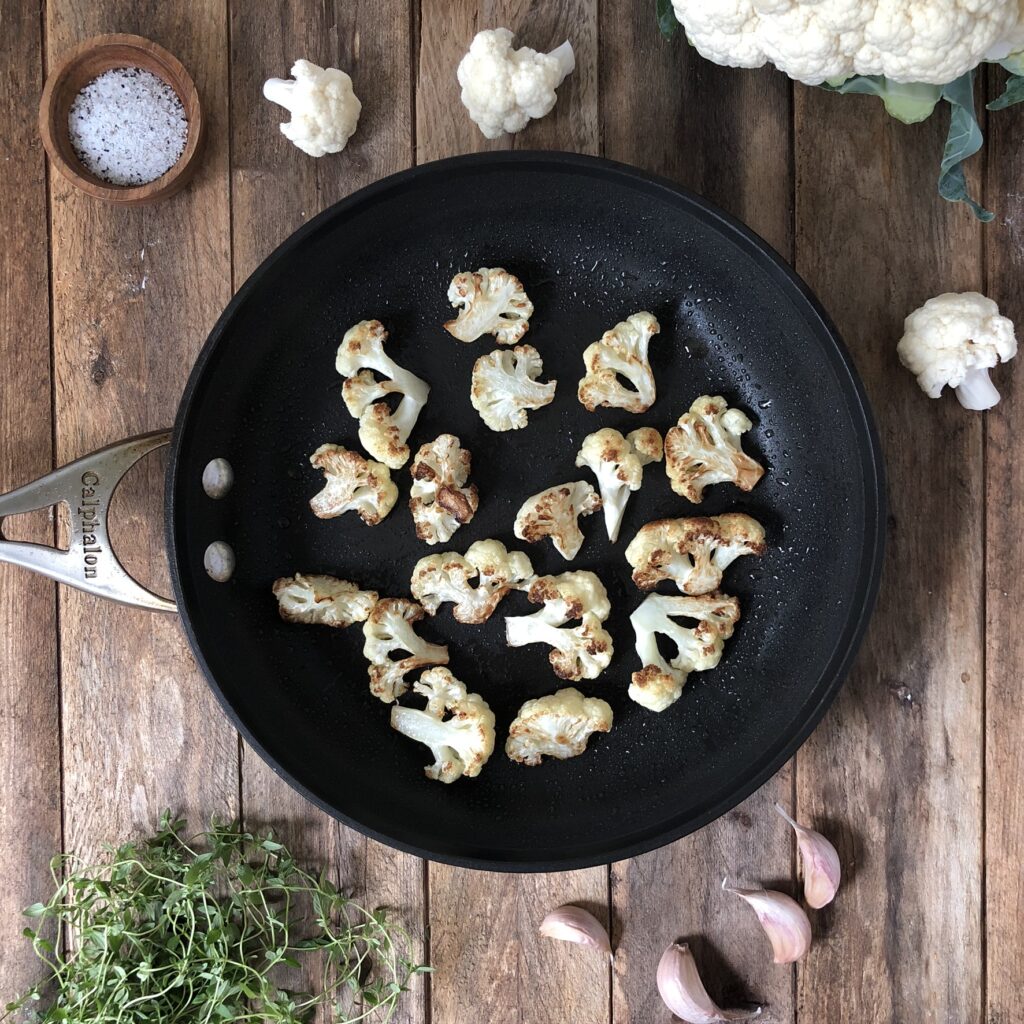 Frying cauliflower in a skillet