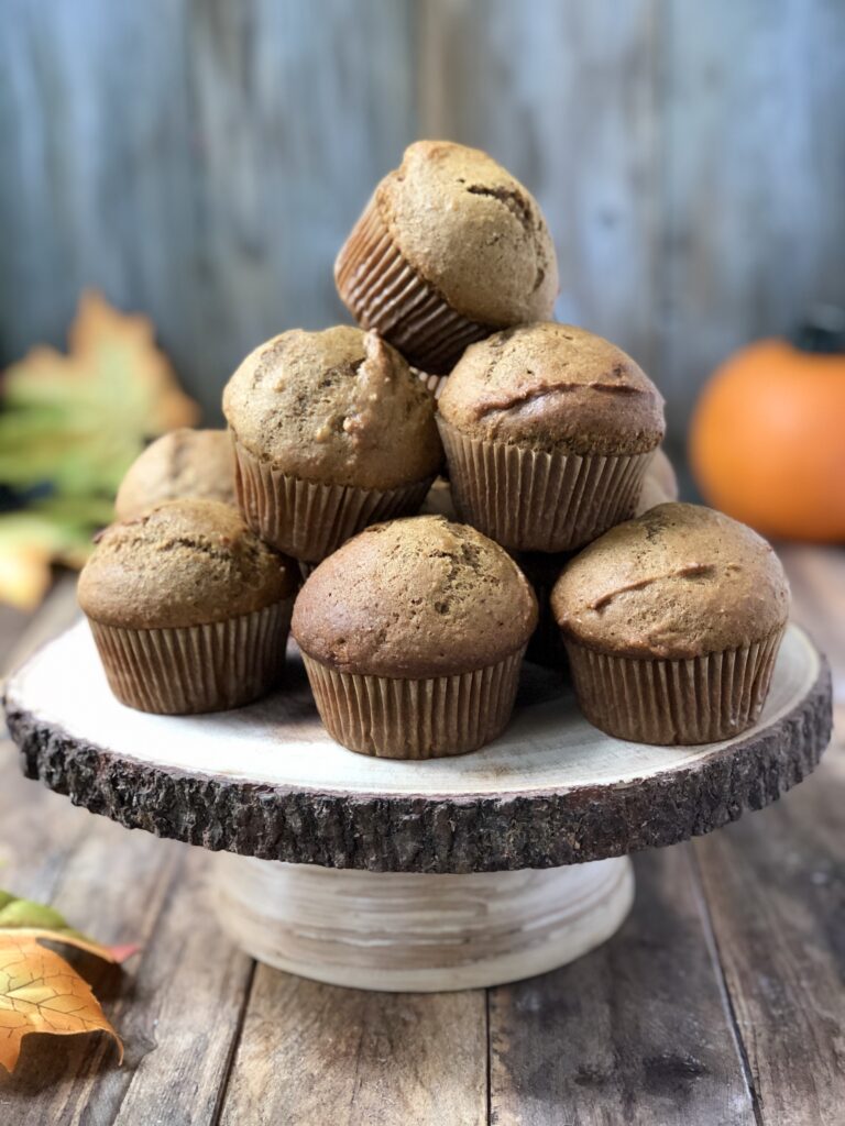 Muffins stacked on pedestal cake stand