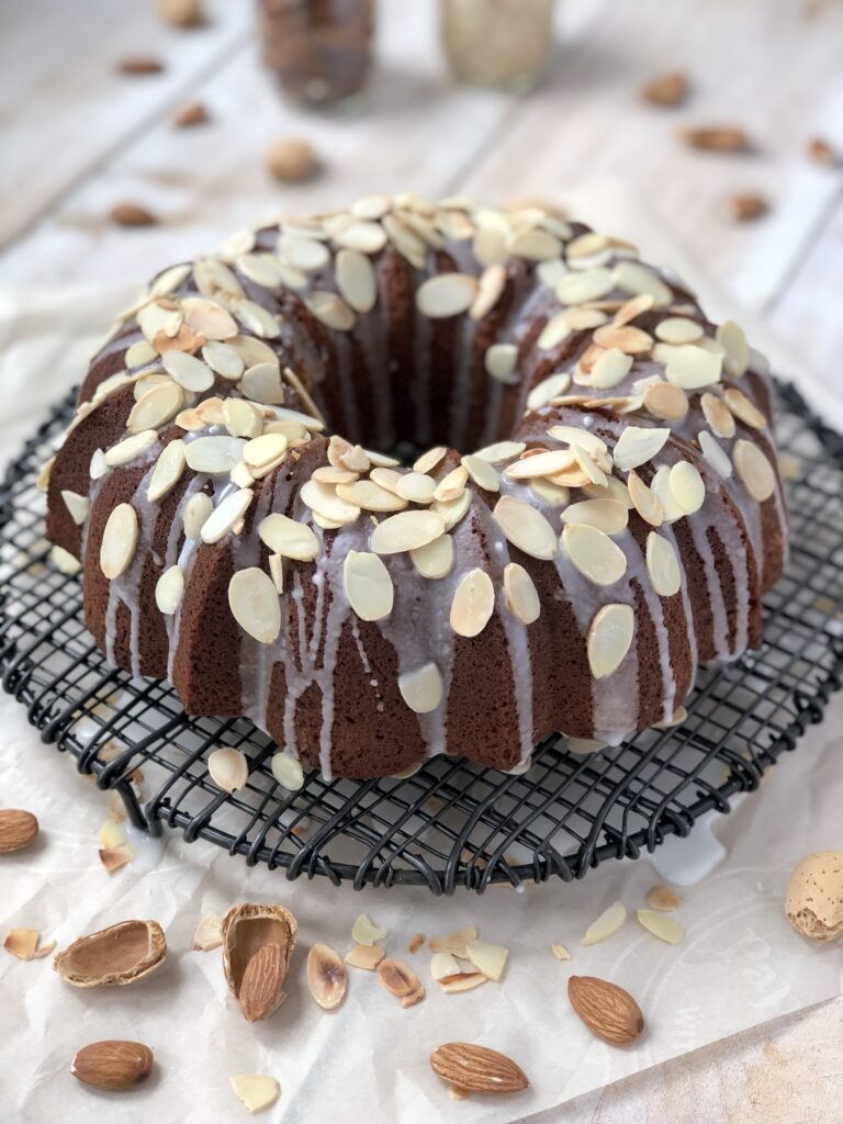 Almond bundt cake on rack