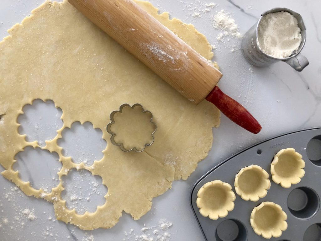 rolling the dough for tarts
