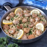 Lemon Garlic Linguini with Scallops in a frying pan