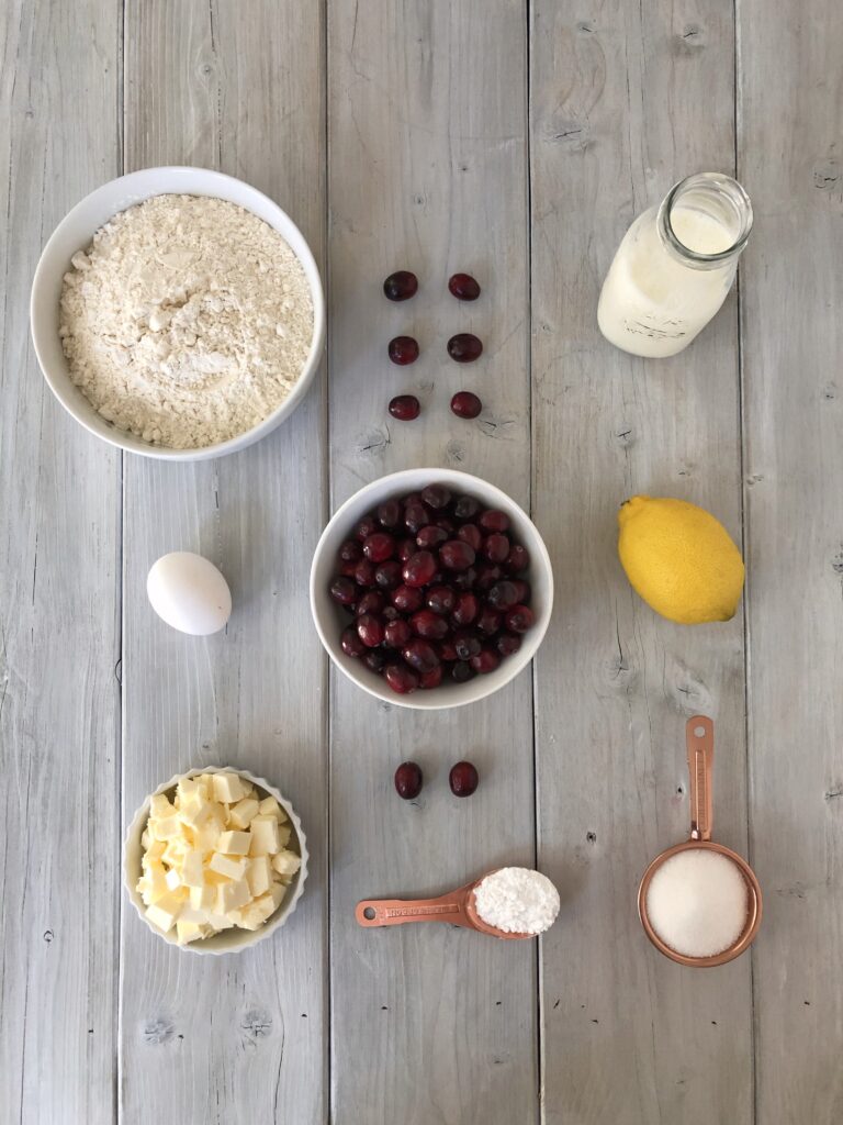 Flour, cream, egg, cranberries, lemon, butter, baking powder and sugar.