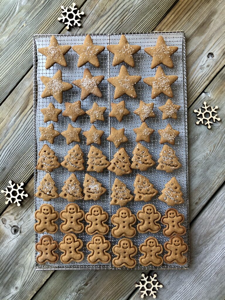 Gingerbread cookies cooling on rack