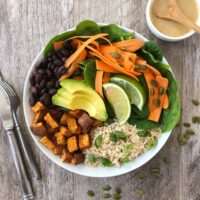 Bowl with sweet potatoes, rice, carrots and spinach