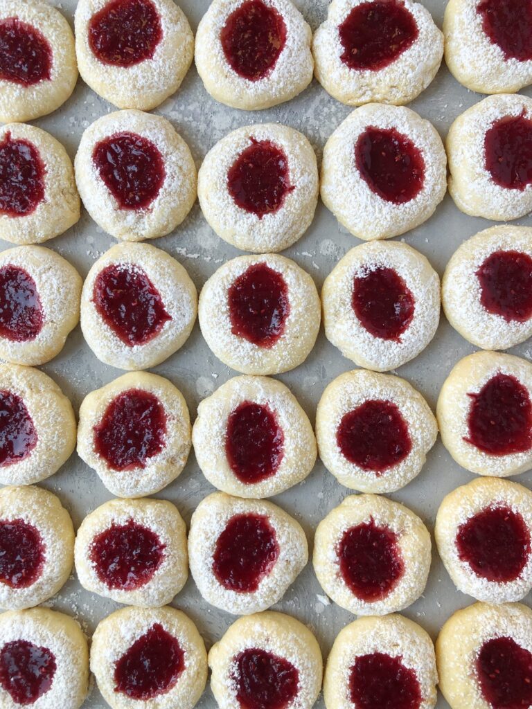 Overhead shot of jam cookies lined up in rows