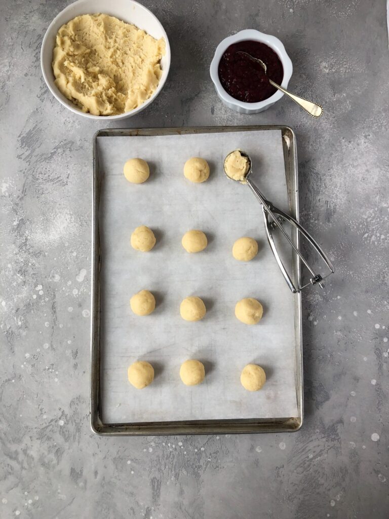 Forming cookies on baking sheet
