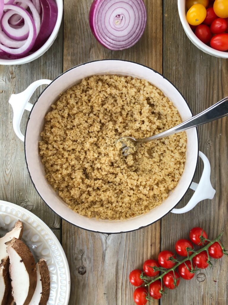 Quinoa cooked in a saucepan.