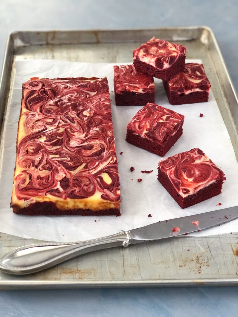 Cutting brownies into squares with a knife.