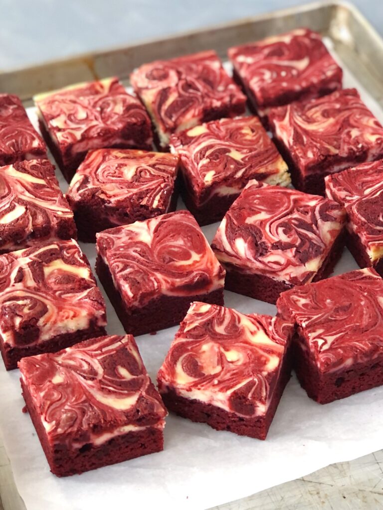Cut red velvet brownies ready to store.