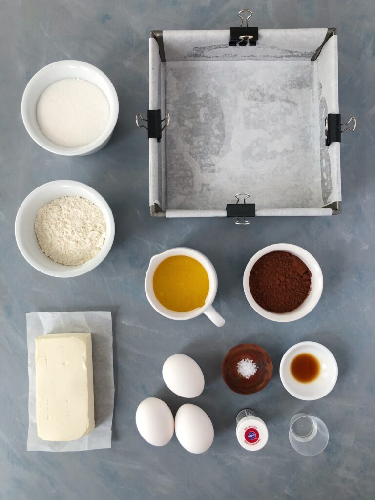 Sugar, flour, butter, cocoa, cream cheese, eggs, food colouring, vanilla and baking pan.