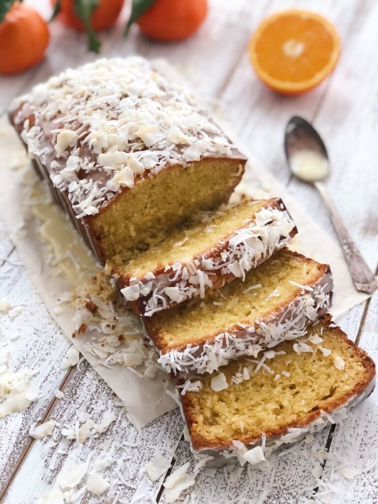 Three slices cut from the orange coconut pound cake.