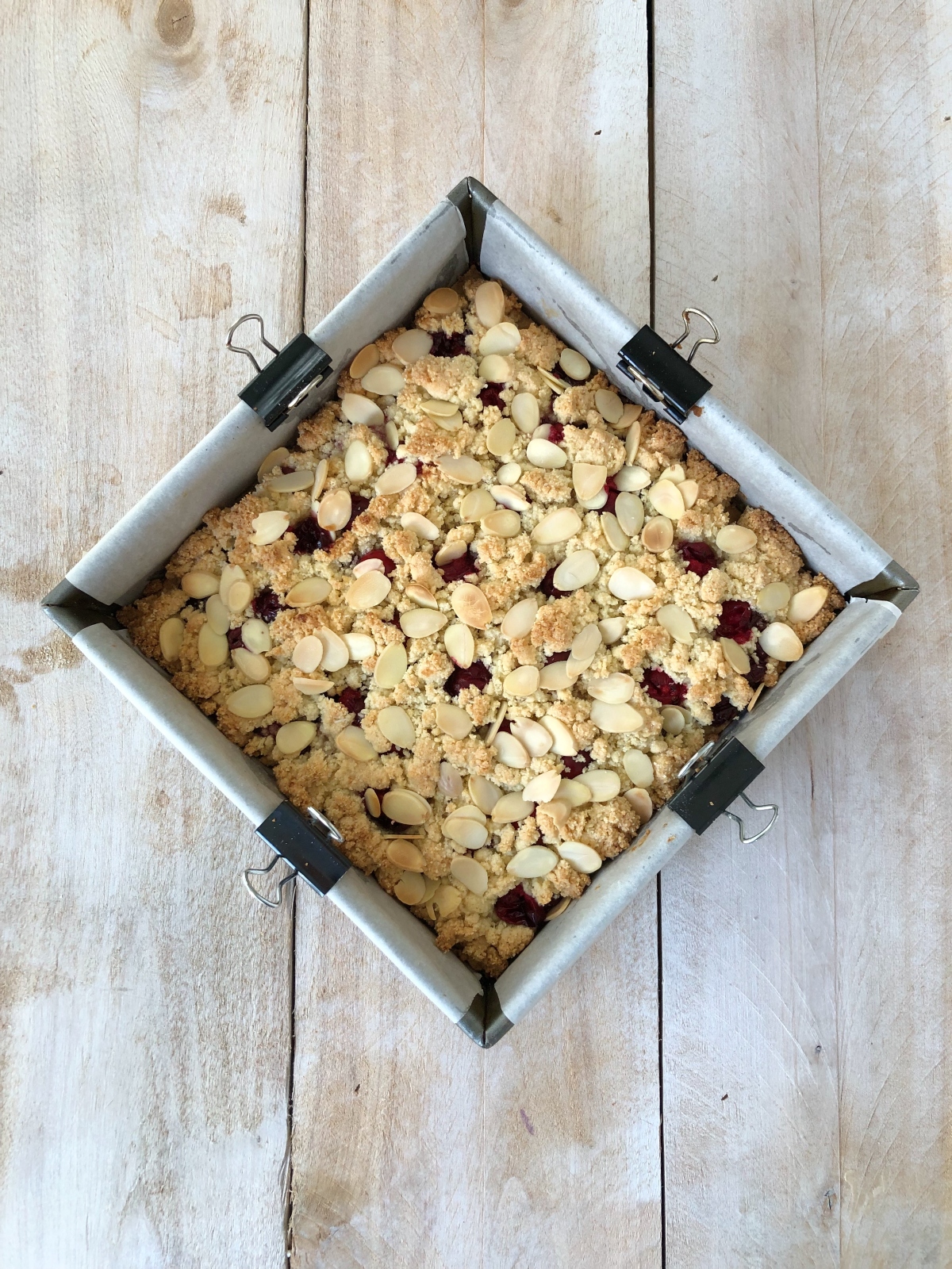 Cranberry bars golden and baked out of oven.