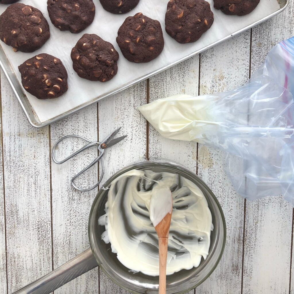 White chocolate in a bag ready to drizzle on cookies