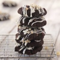 Macadamia cookies stacked in a pile.