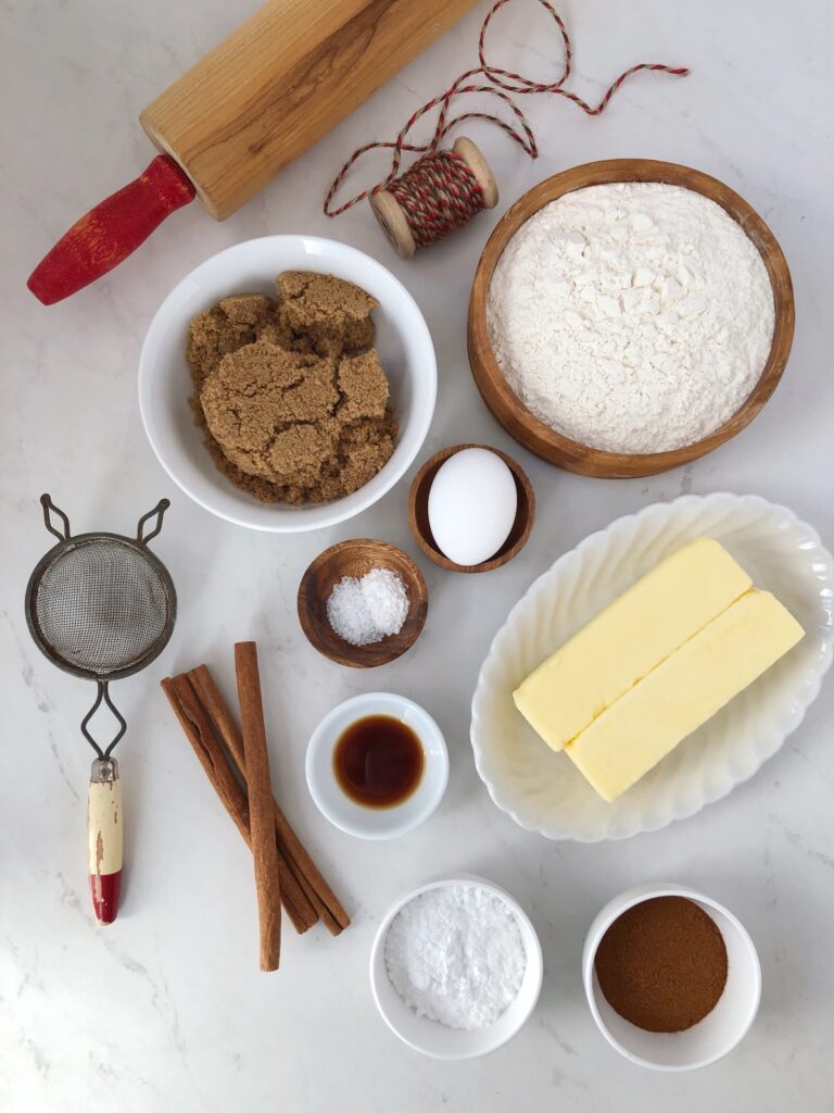 Butter, sugar, egg, vanilla, flour, baking powder, salad, cinnamon and icing sugar