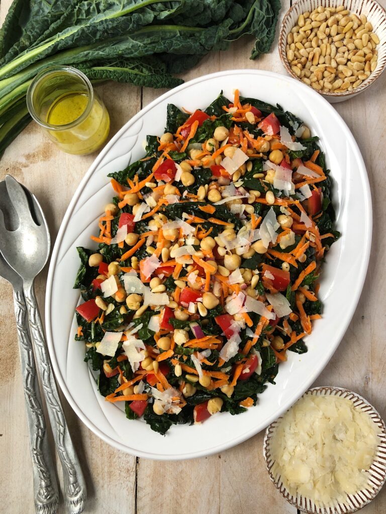 Kale salad ready to serve with garnishes