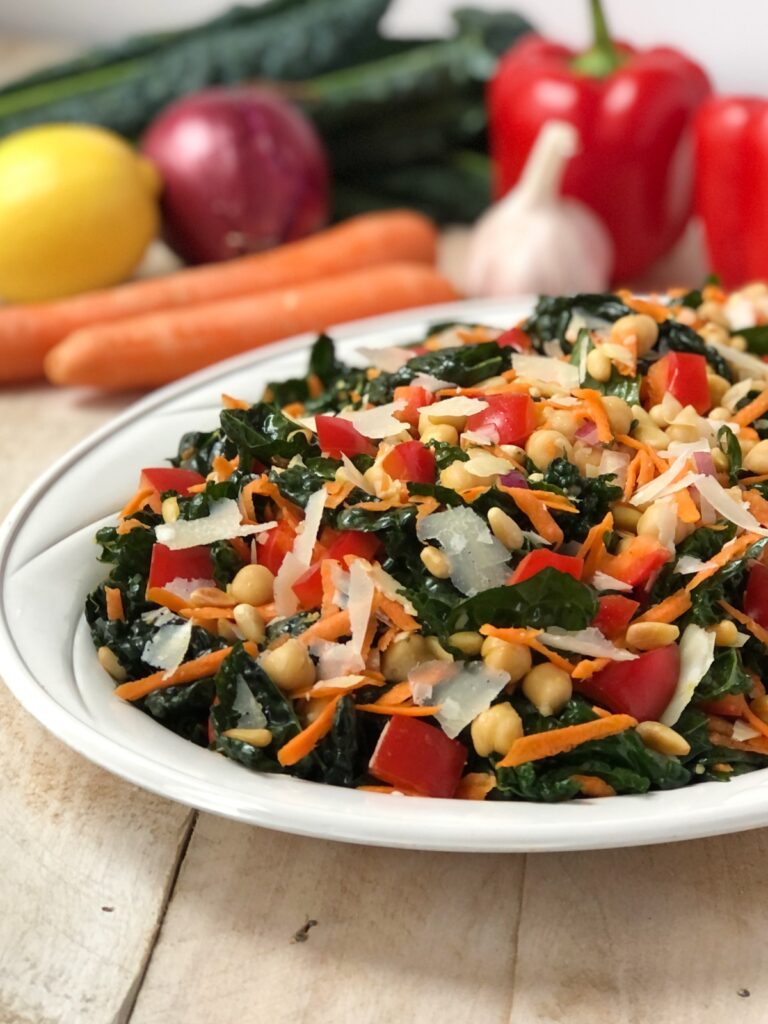 Cropped view of salad on a white platter.