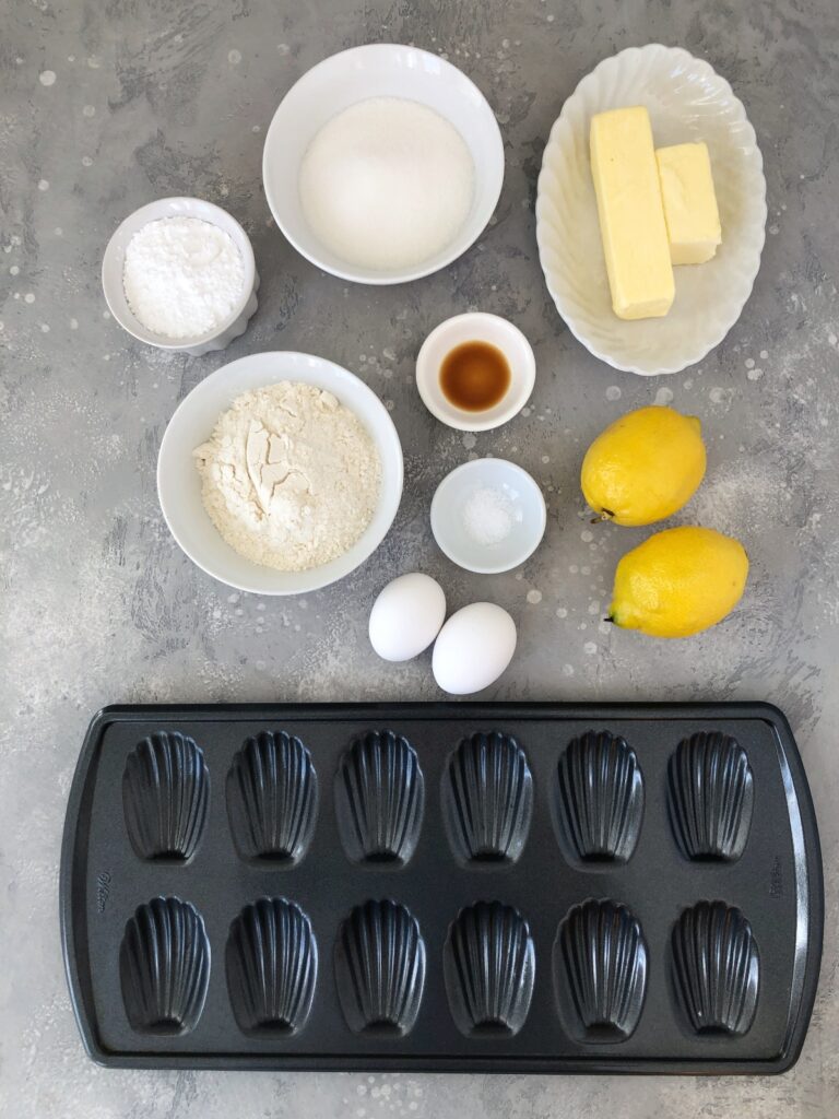 Sugar, flour, butter, vanilla, salt, lemon, eggs, madeleine pan.
