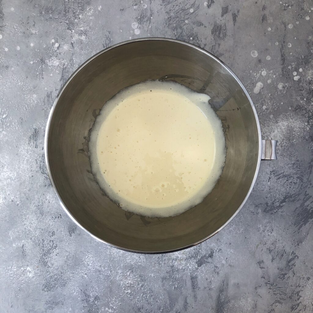 Mixing bowl with eggs and butter beaten together.