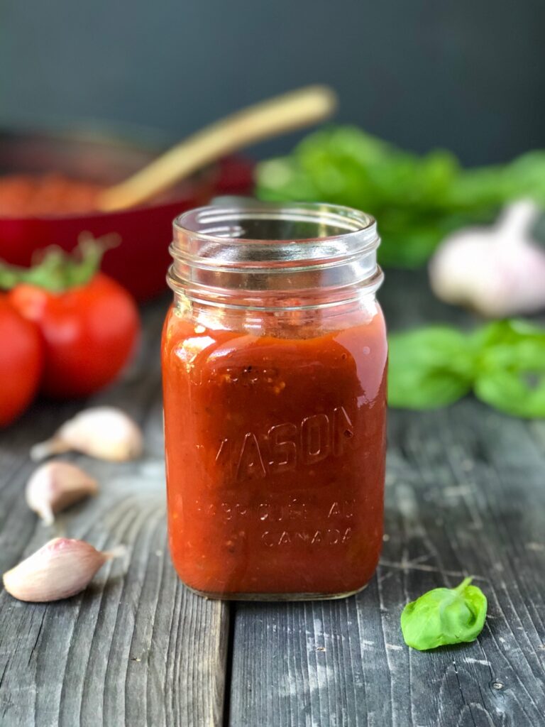 Marinara sauce in a mason jar.