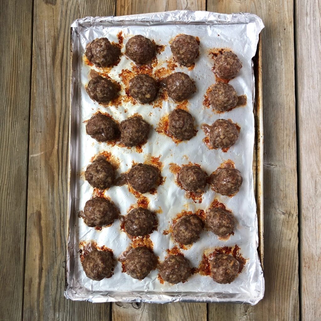 Cooked meatballs out of the oven.