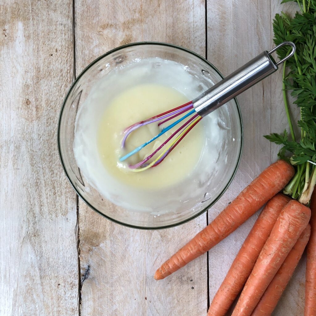 Icing sugar whisked into cream cheese mixture.