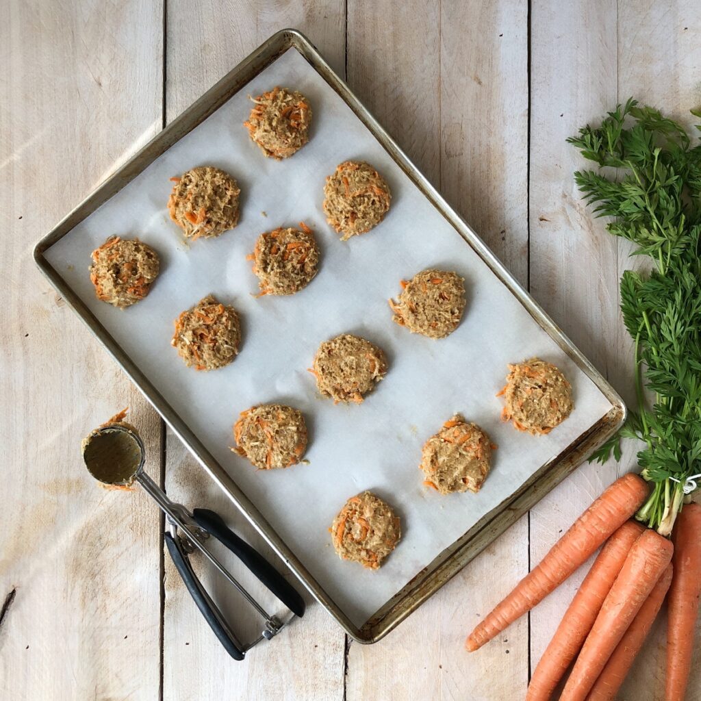 Cookie dough scooped out and arranged on baking sheet.